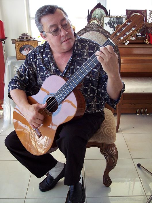 carlitin playing guitar
