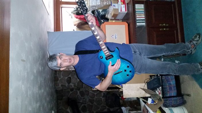 Holding my brand new Gibson Les Paul